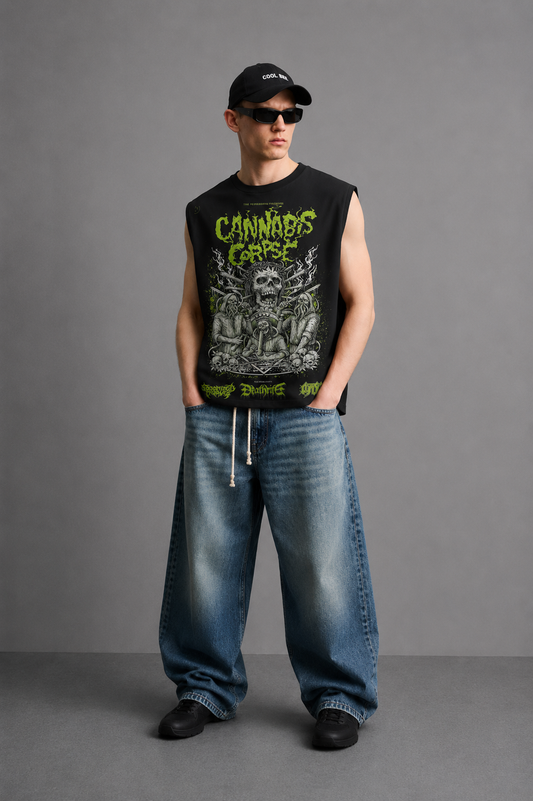 Black tank top with a horror-comic skeletal figure illustration surrounded by leafy plant motifs and bold neon-green lettering.