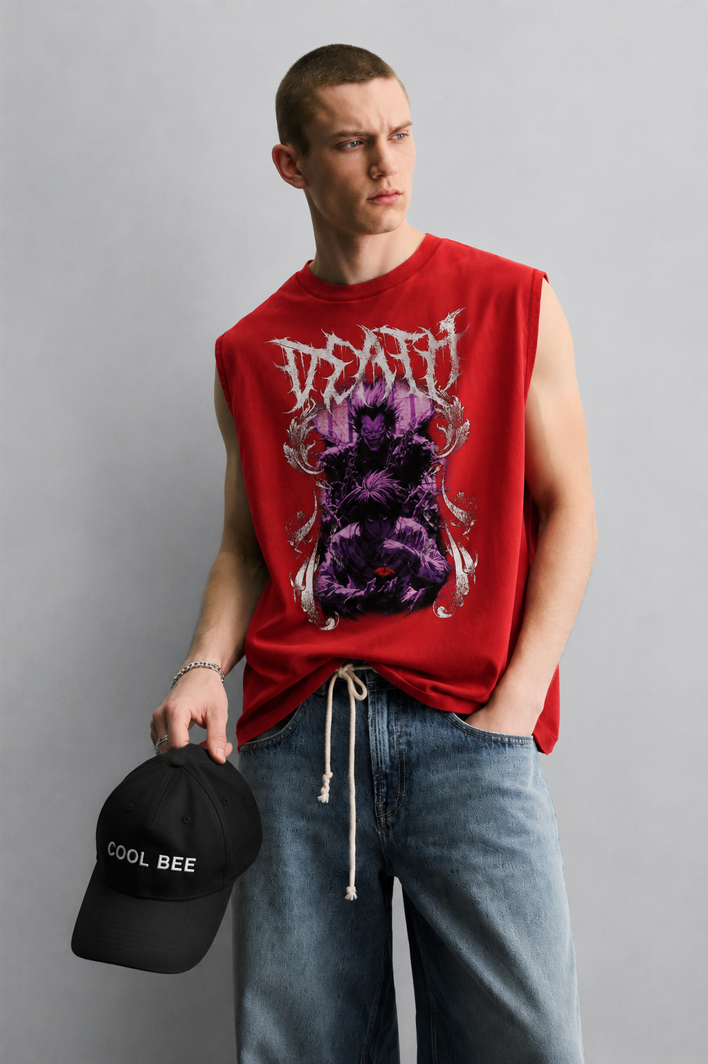 Red tank top with bold jagged 'Death' lettering above a purple-toned illustration of a demonic figure with clawed hands and a glowing red eye.