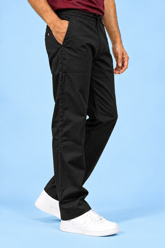 Cool Bee Linen Travel Pants Black – side view mid-stride, black linen travel pants