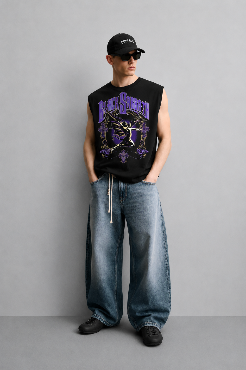 Black tank top with a large inverted cross illustration surrounded by smoke and flame details beneath heavy gothic lettering.