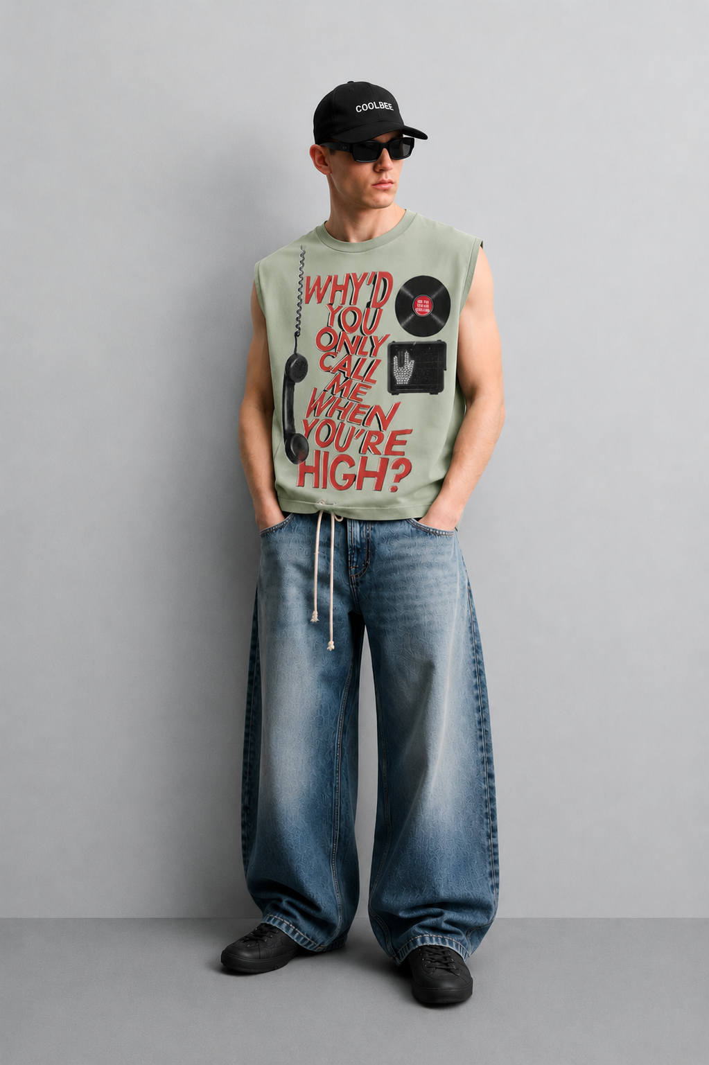 Sage green tank top with a retro telephone illustration and bold vintage-style lettering across the chest.