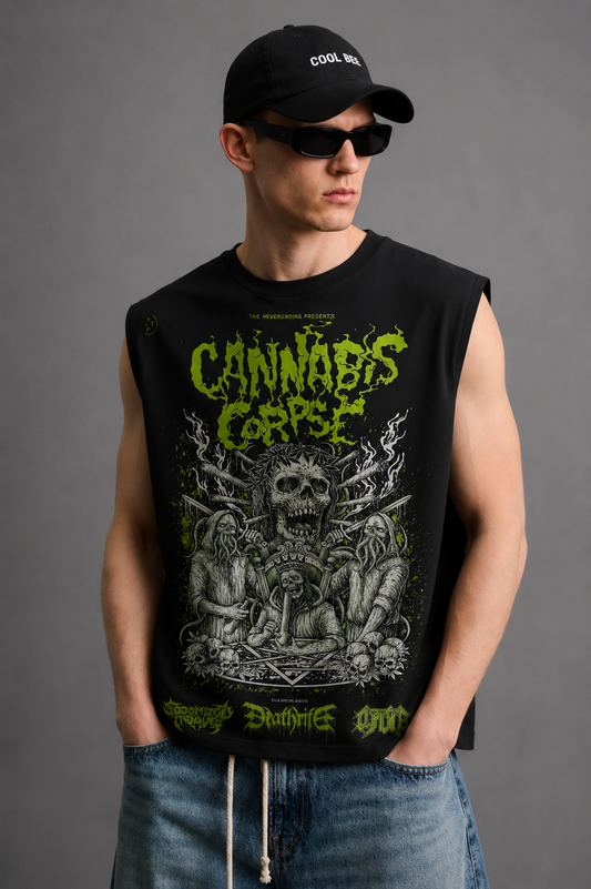 Black tank top with a horror-comic skeletal figure illustration surrounded by leafy plant motifs and bold neon-green lettering.