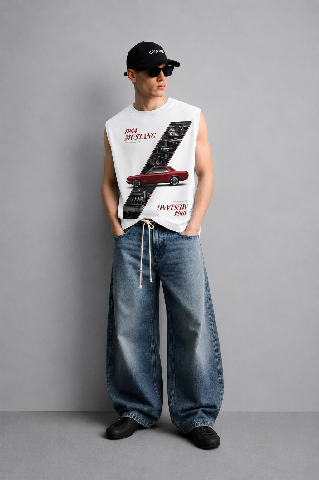 White tank top with a vintage muscle car illustration in a retro racing poster style with checkered flag accents and bold script lettering.