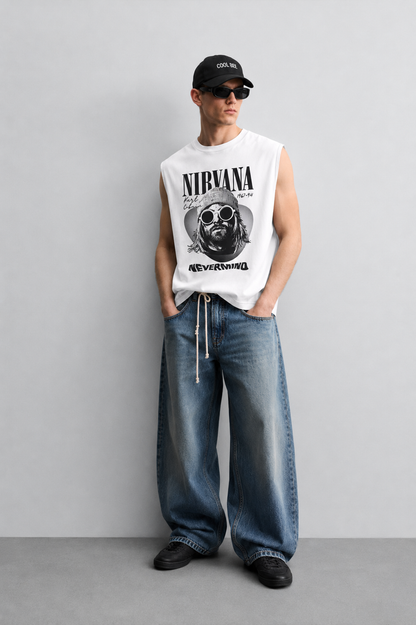 White tank top with bold serif band-style lettering, a halftone portrait of a musician in a beanie and round sunglasses inside a guitar-pick silhouette, and large album-title-style text at the bottom.