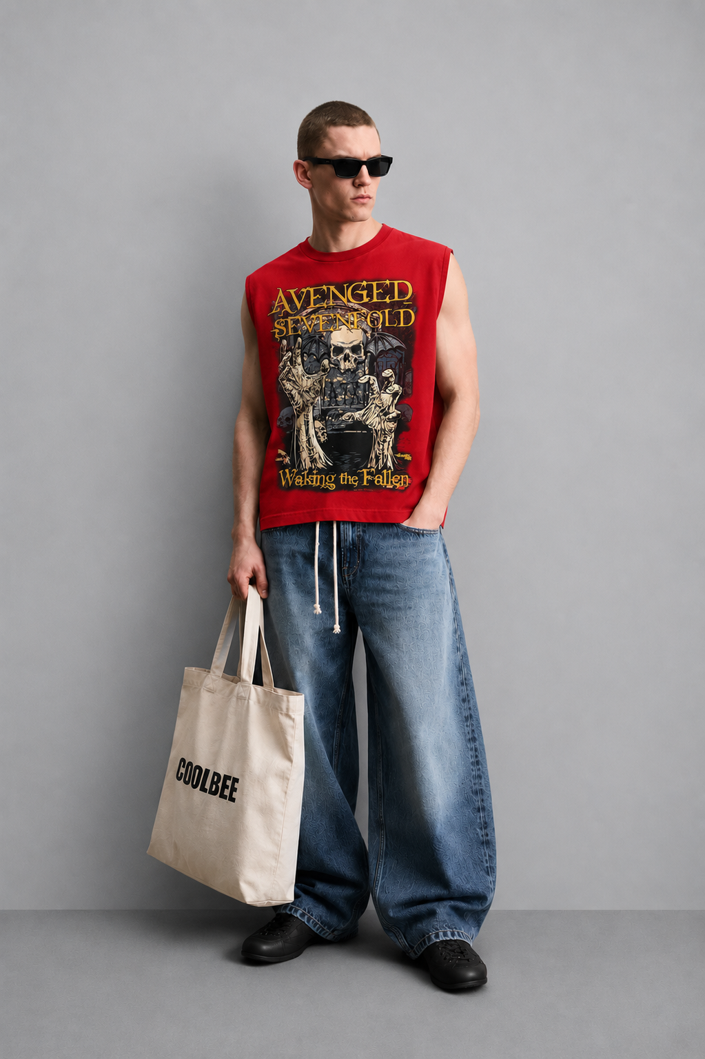 Red tank top with a distressed winged-skull graphic and bold gothic lettering in a horror-rock poster style.