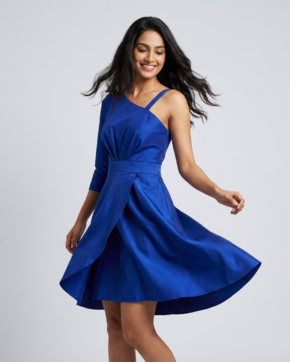 Shop the Royal Blue One-Shoulder Cocktail Dress. Premium satin finish with asymmetric long sleeve and pleated bodice. The perfect tailored evening dress for weddings and parties. Fast shipping available.