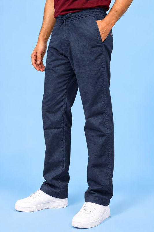 Cool Bee Linen Travel Pants Navy – three-quarter view of navy relaxed straight-fit linen pants