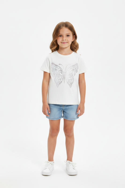 Girl in studio wearing off-white rhinestone tee