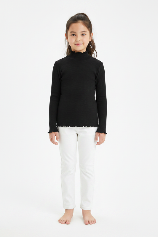 Girl on white background wearing black ribbed turtleneck top