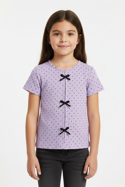 Coolbee Store – Girl on white background wearing lilac polka dot bow top