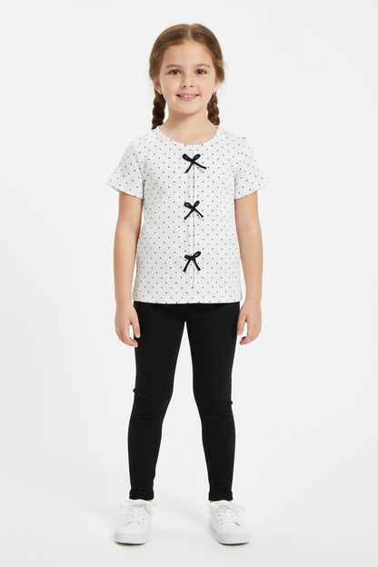Coolbee Store – Girl on white background wearing white polka dot bow top