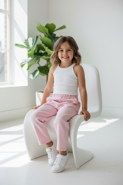 Coolbee Store – Girl on white chair wearing white ribbed halter neck top