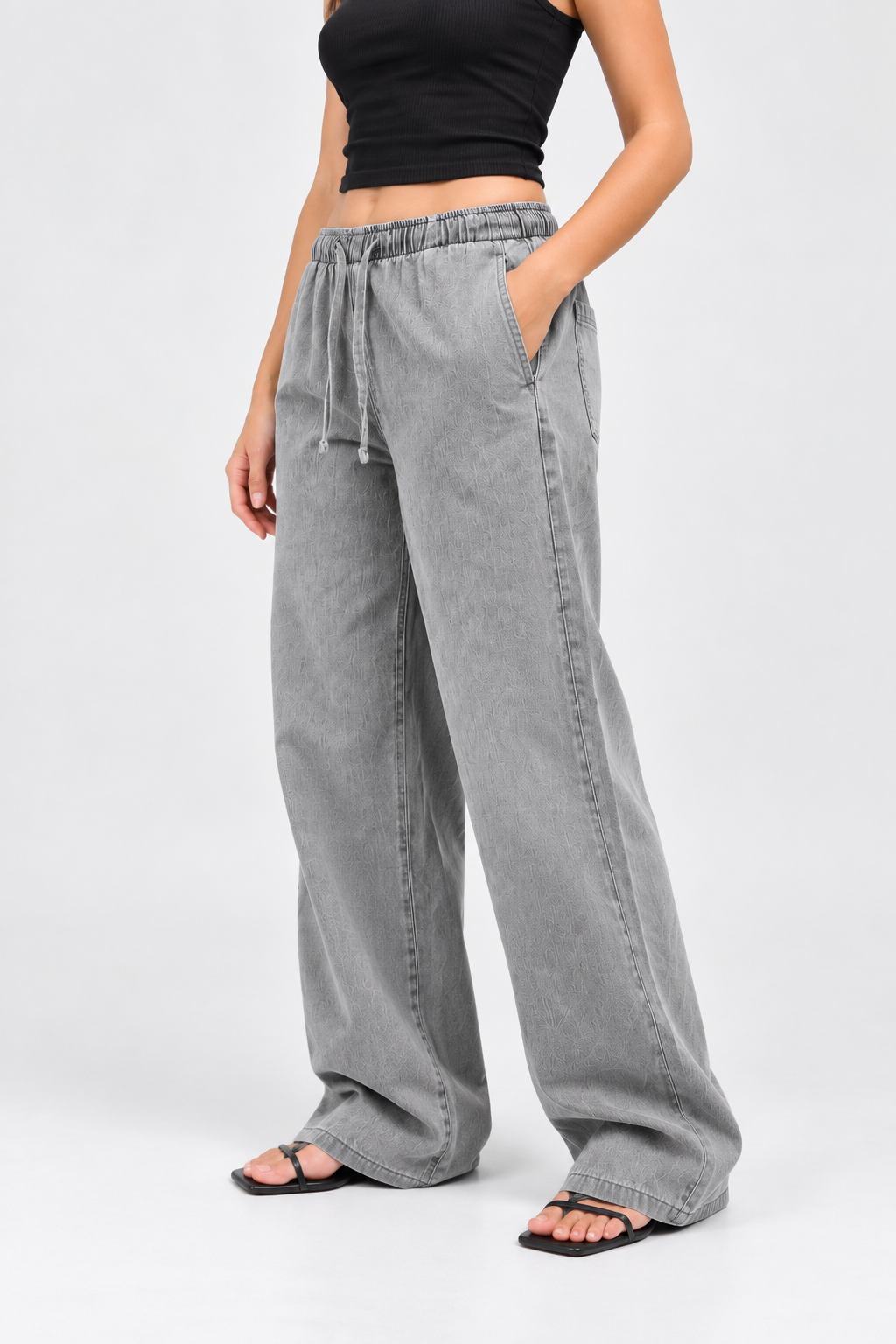 Cool Bee Cotton Denim Wide Leg Joggers in Grey - side view with hand in pocket